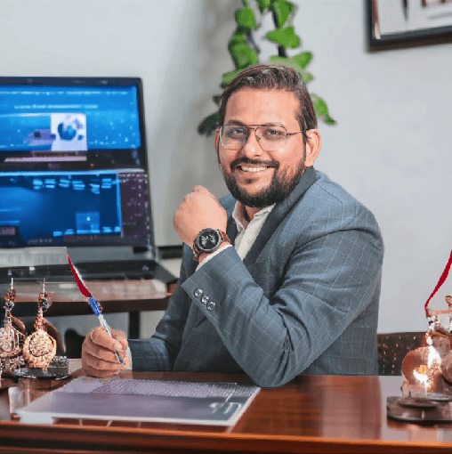 Founder of Hanuman Care Dr. Niraj Jha in his office of Hanuman Care